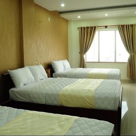 Canh Buom Hotel Danang Pokoj fotografie