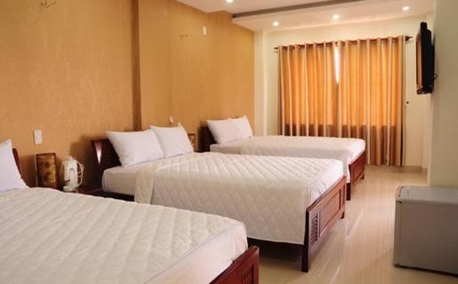 Canh Buom Hotel Danang Pokoj fotografie
