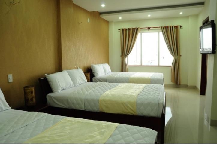 Canh Buom Hotel Danang Pokoj fotografie