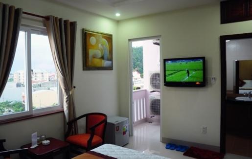 Canh Buom Hotel Danang Pokoj fotografie
