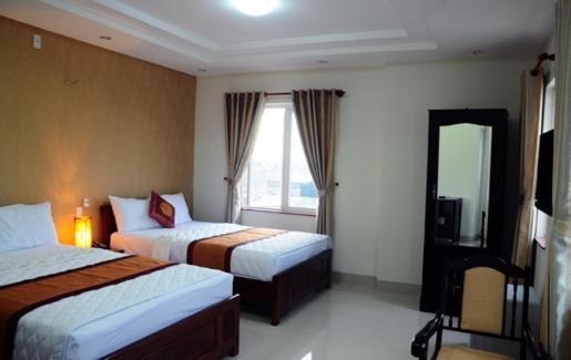 Canh Buom Hotel Danang Pokoj fotografie
